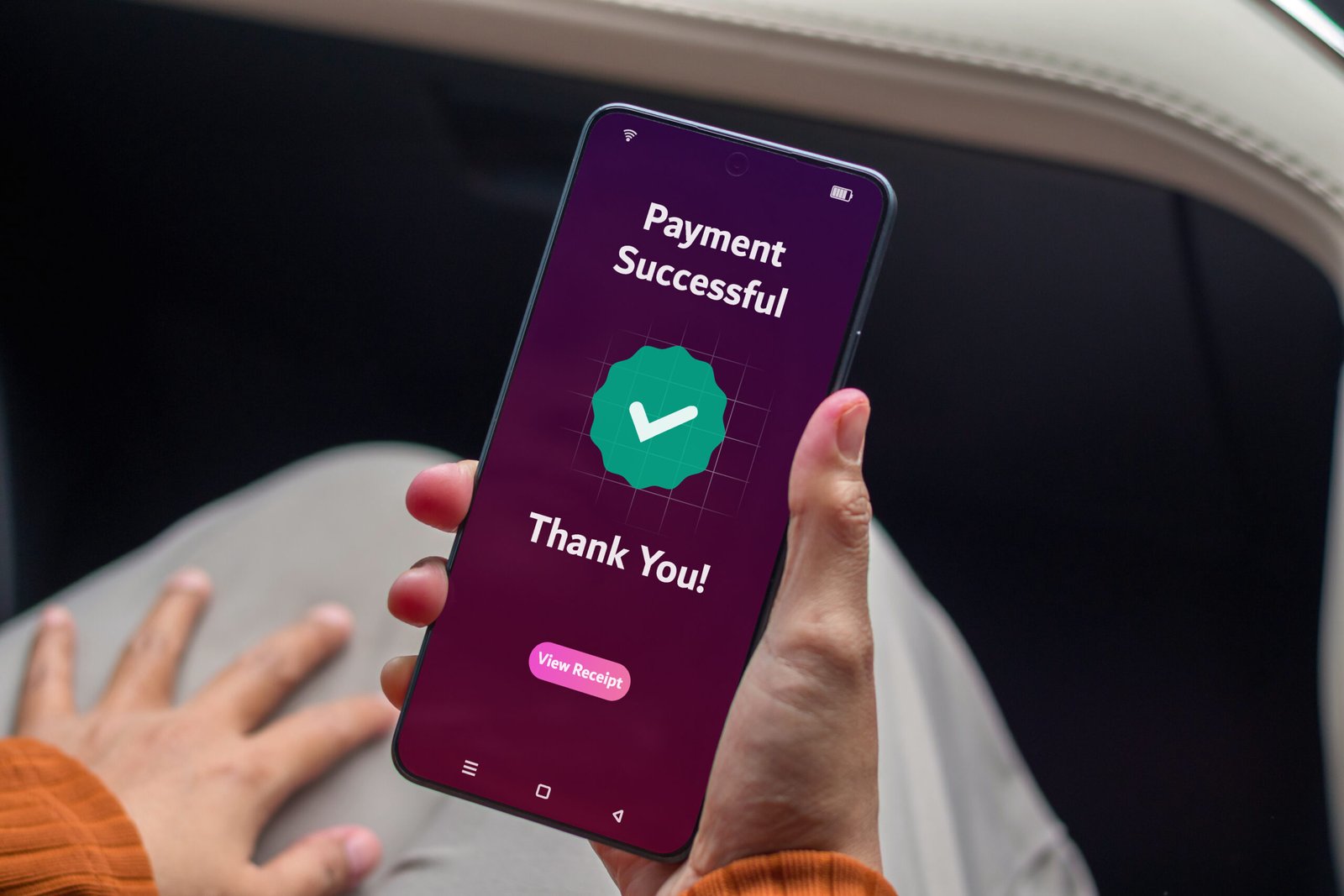 A woman making payment for online shopping using a mobile phone. Online payment successful concept.